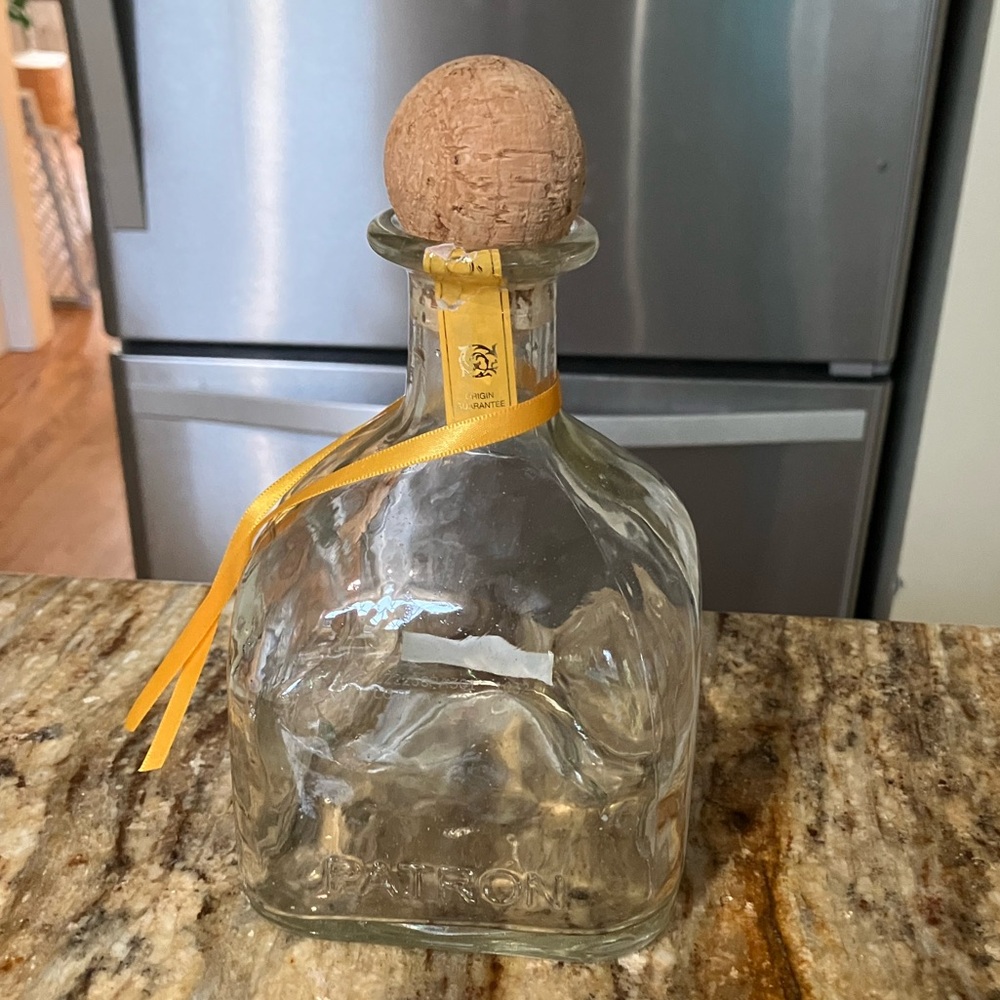 Patron container, empty.